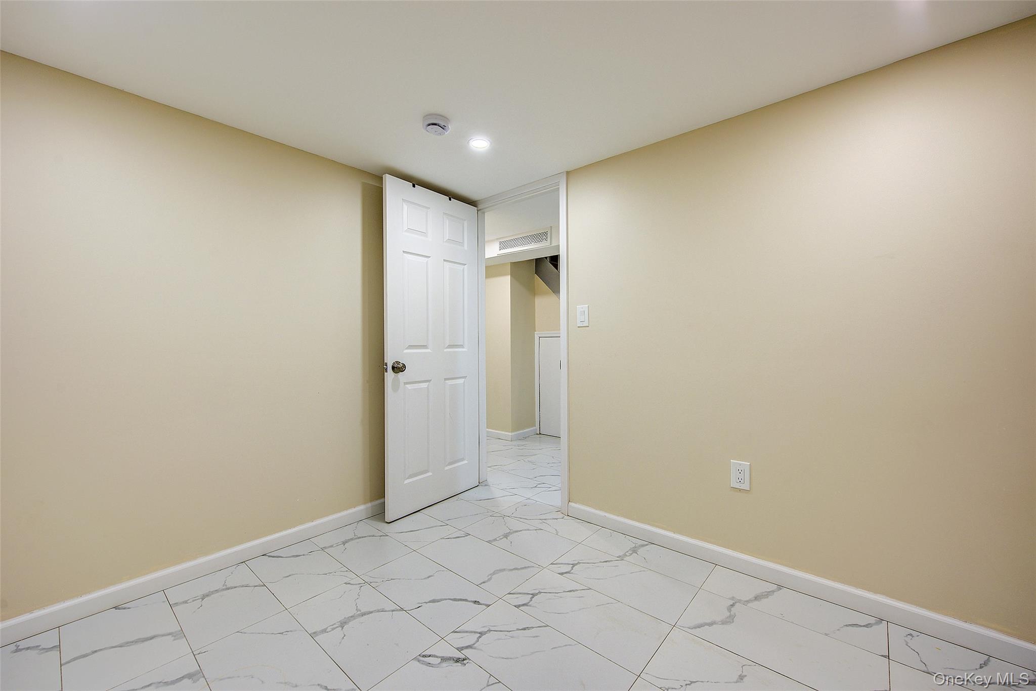 164-38 76th Road Queens, NY 11366 - Photo 37 of 44 a view of an empty room