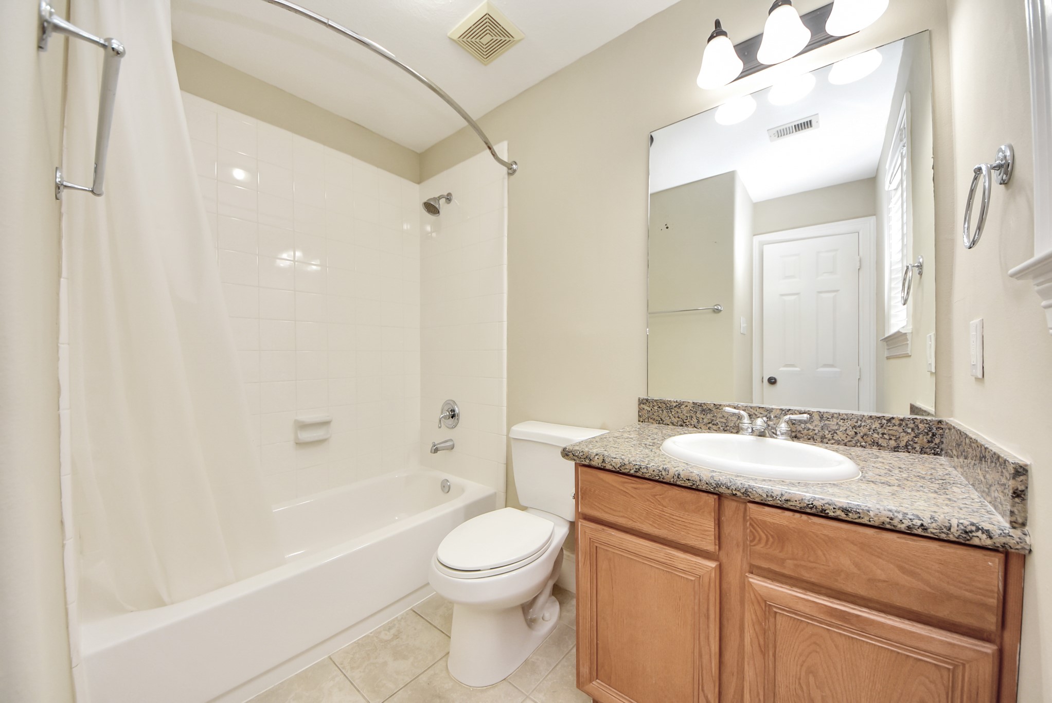 2119 Stuart Street Houston, TX 77004 - Photo 7 of 37 The ensuite bathroom is nicely updated!