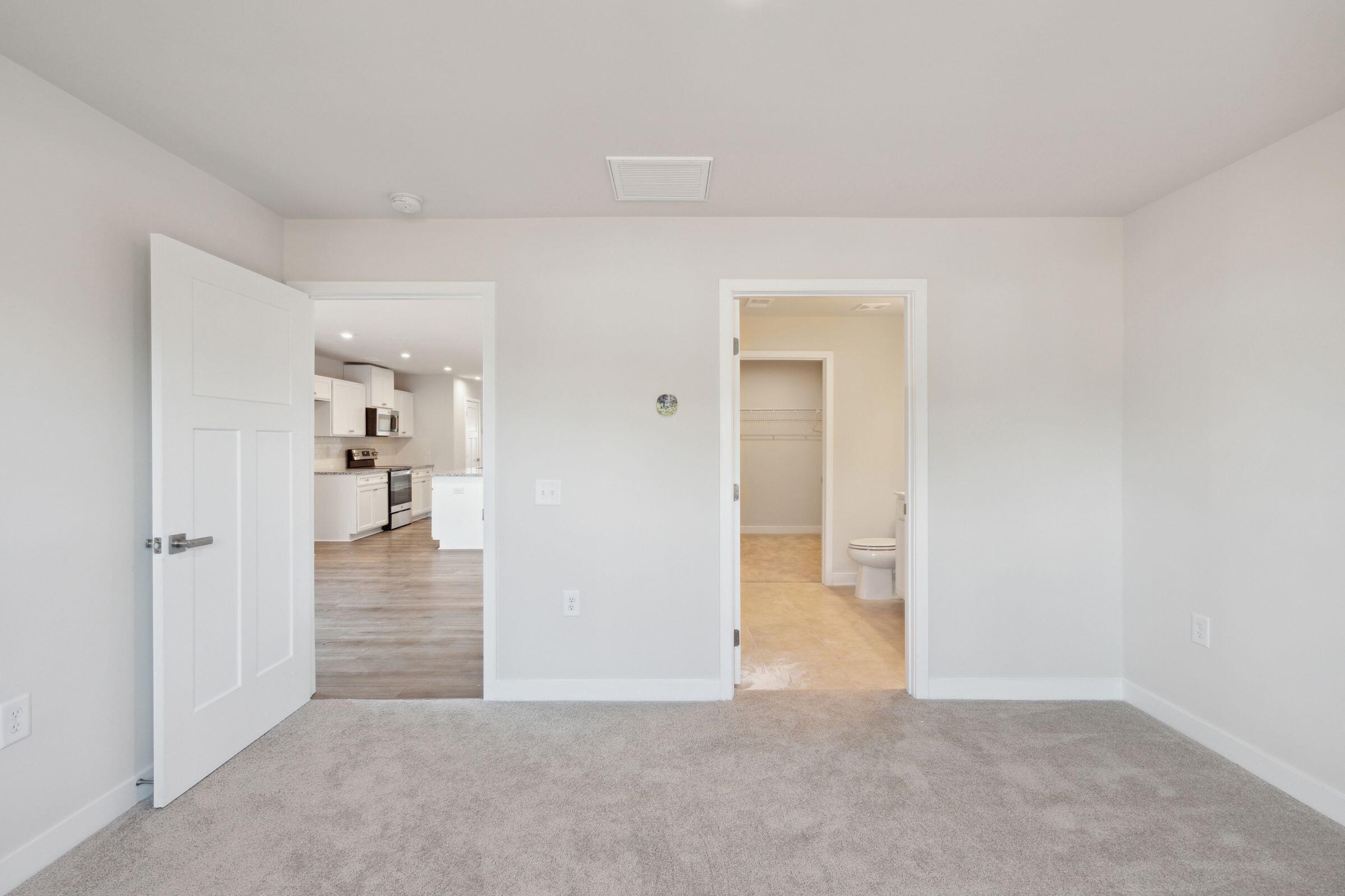 304 Picard Loop Santee, SC 29142 - Photo 9 of 24 Main Level Primary Bedroom