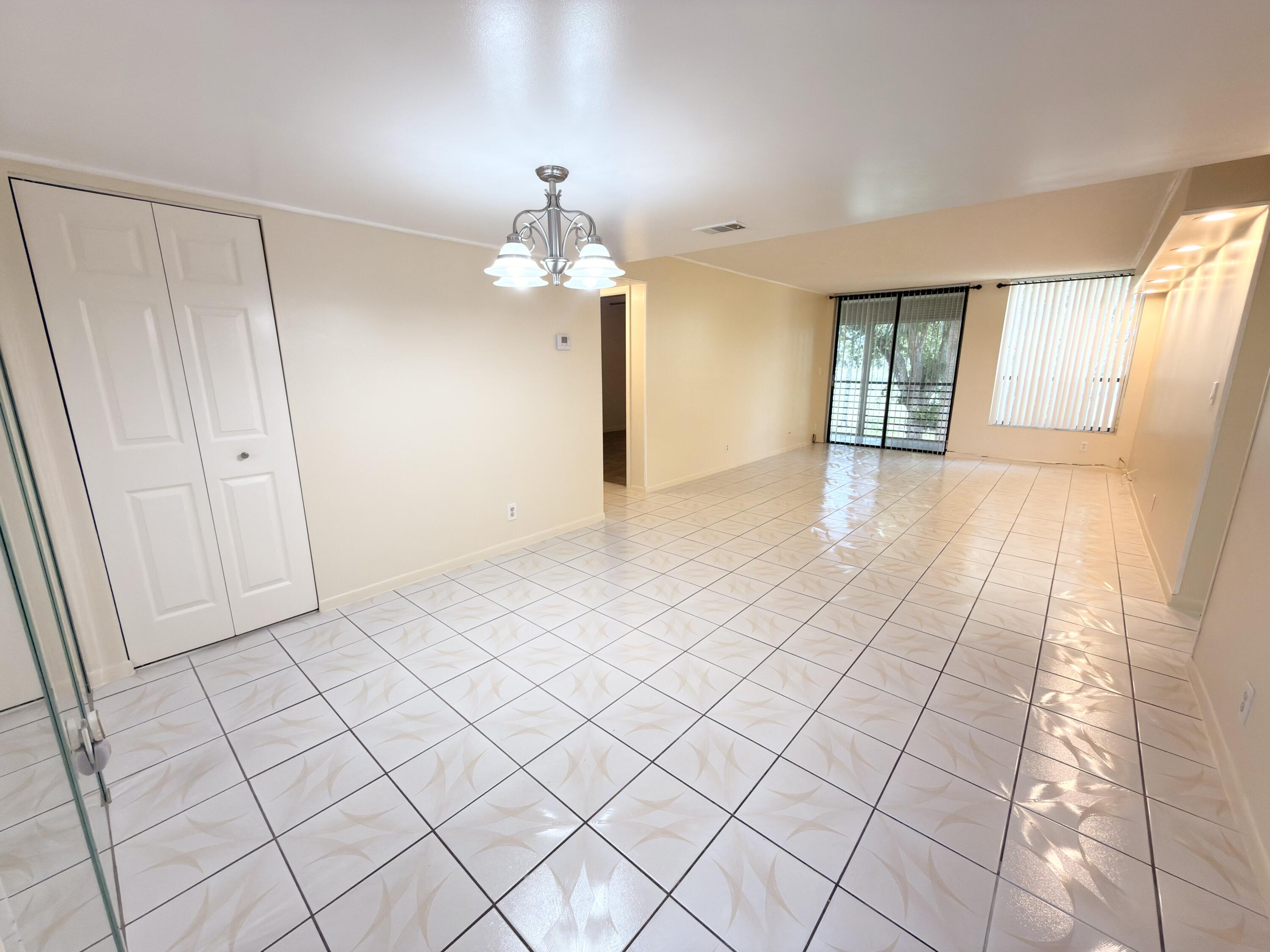 7650 West McNab Road, Unit 210 Tamarac, FL 33321 - Photo 1 of 13 Living/Dining Room