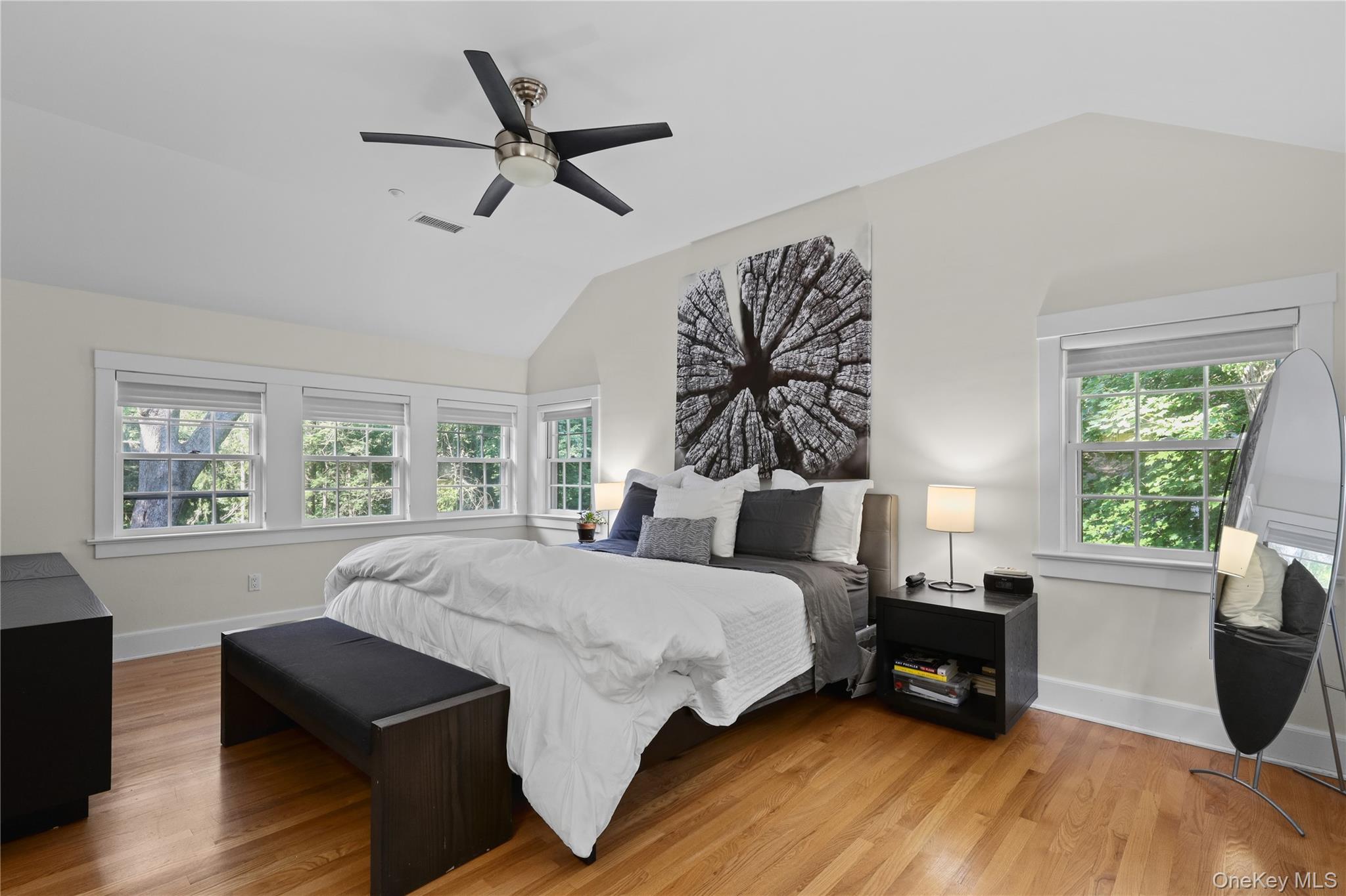 131 Douglas Road Chappaqua, NY 10514 - Photo 14 of 26 a bedroom with a bed a couch and a large window