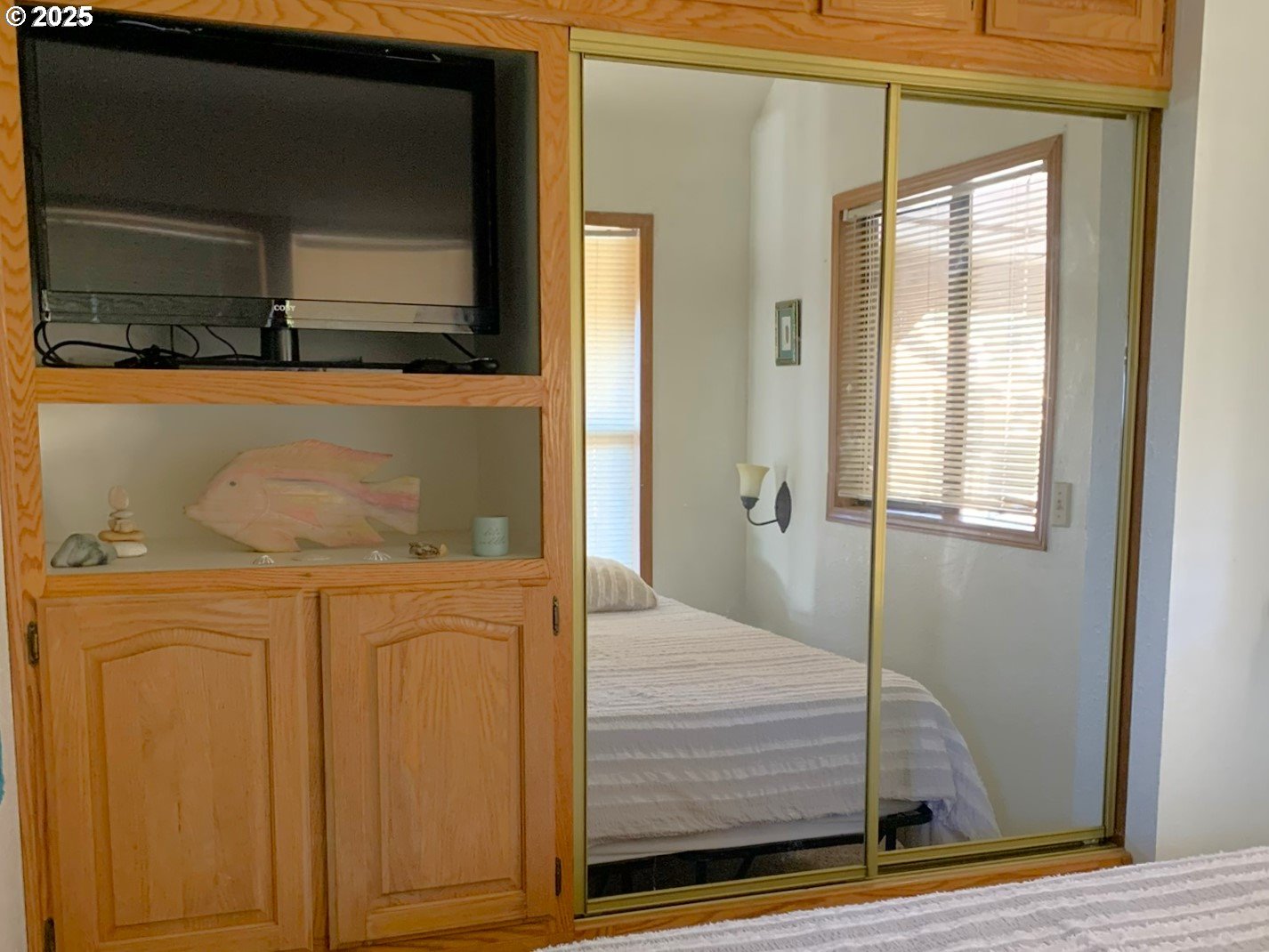 19921 Whaleshead Road, Unit OV13 Brookings, OR 97415 - Photo 24 of 43 a bathroom with a sink a mirror and shower