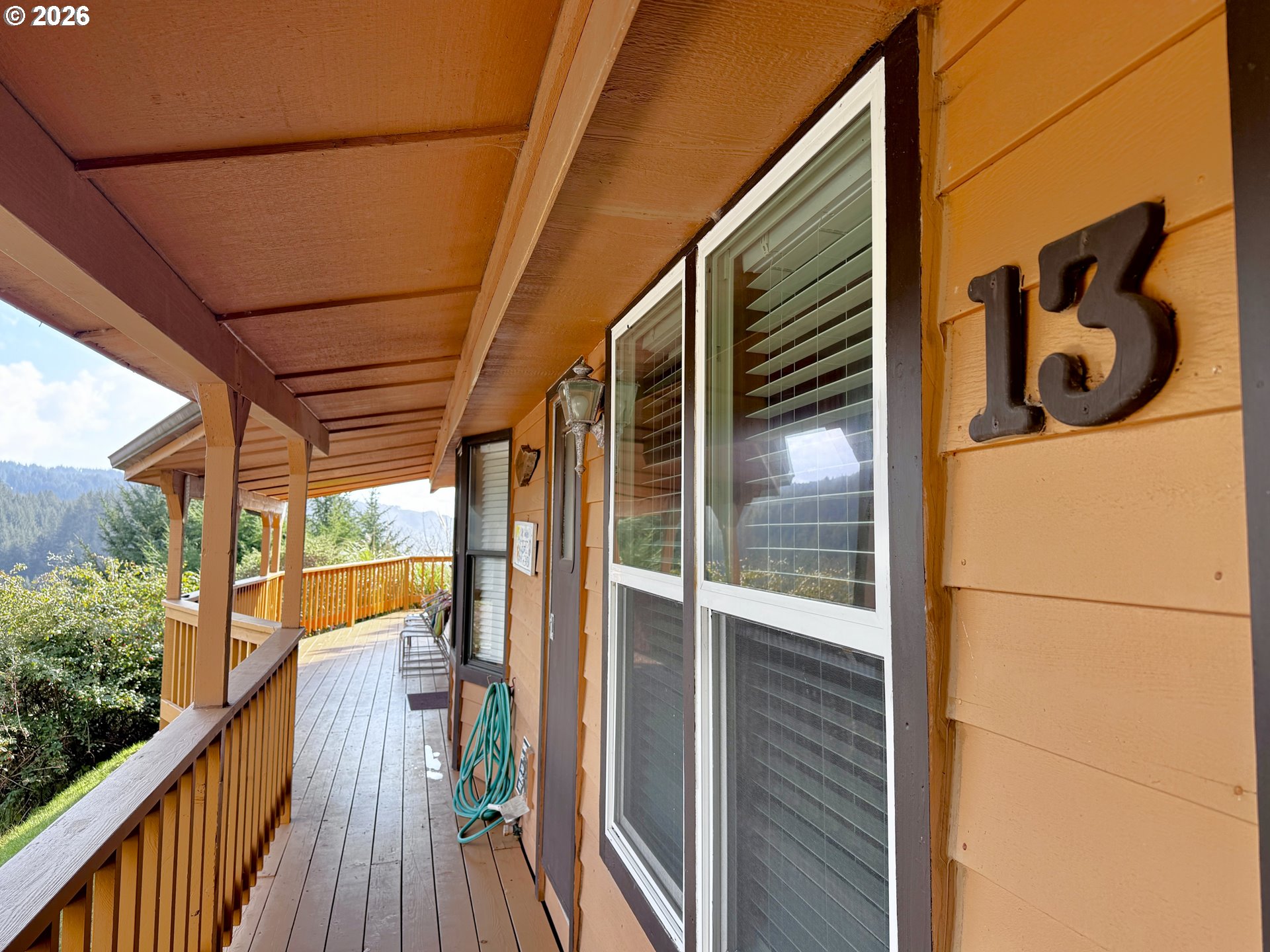 19921 Whaleshead Road, Unit OV13 Brookings, OR 97415 - Photo 38 of 43 a view of a door and a window