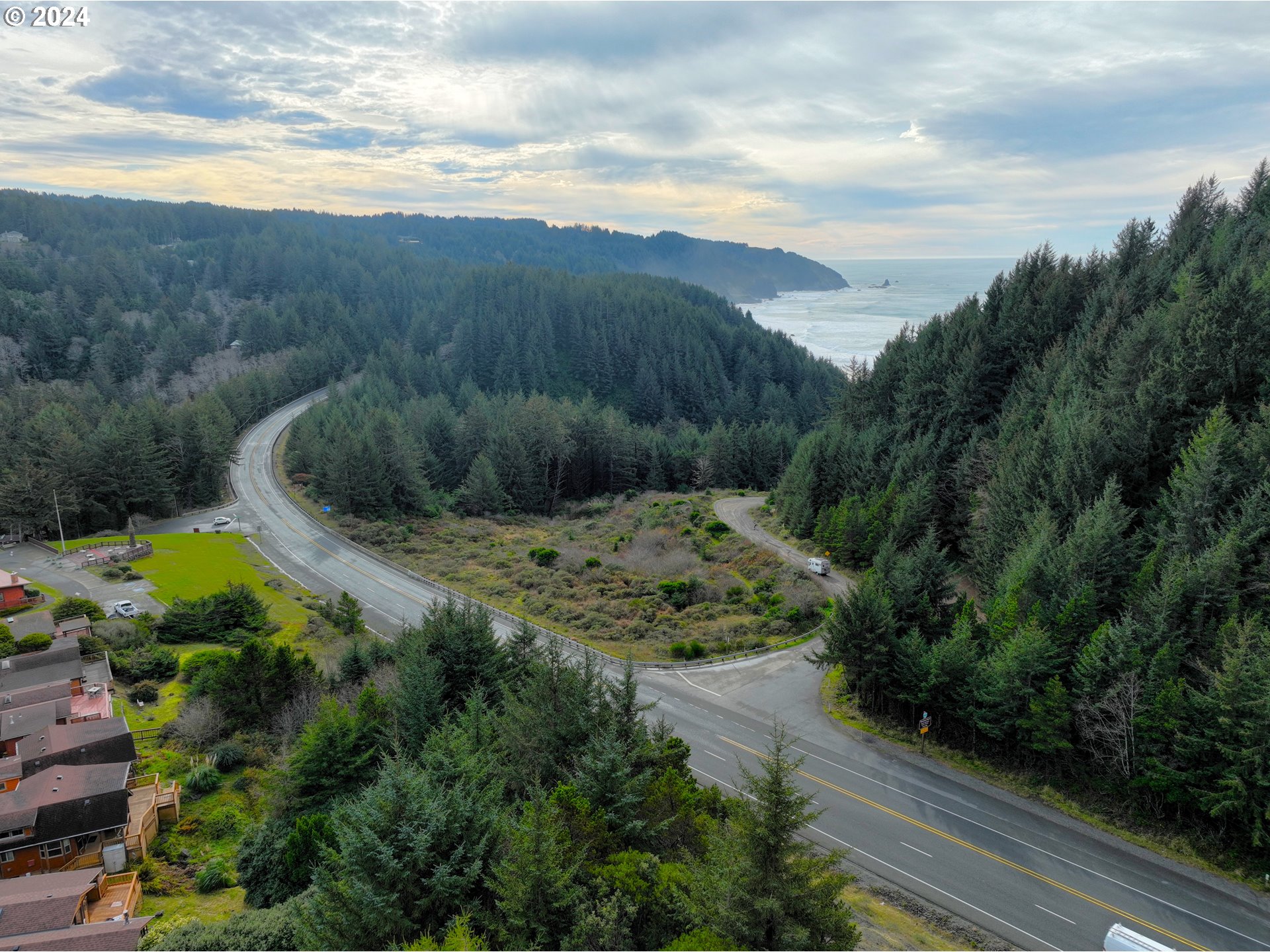 19921 Whaleshead Road, Unit OV13 Brookings, OR 97415 - Photo 9 of 43 a view of a backyard with green space