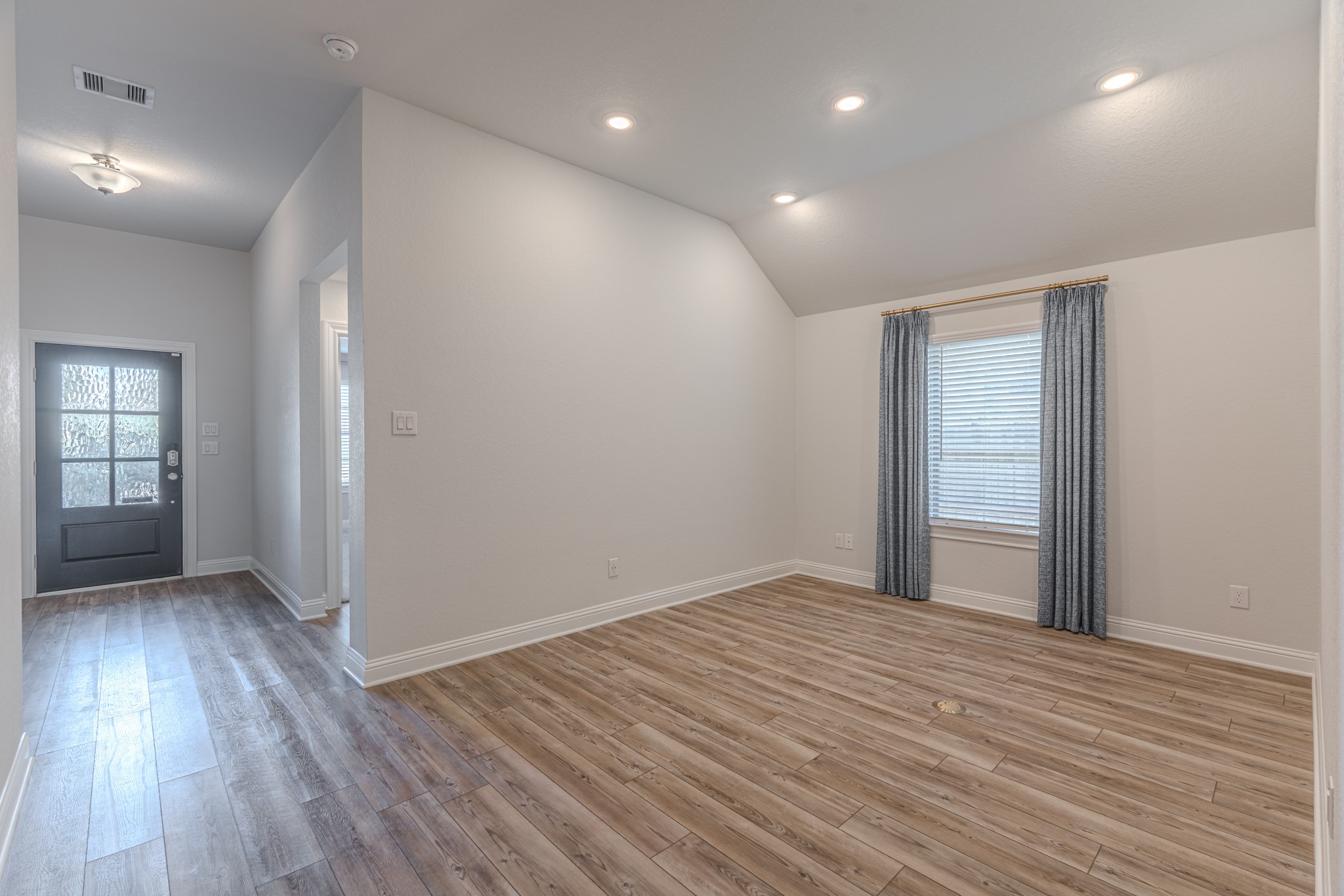 9840 Sweet Flag Court Conroe, TX 77385 - Photo 12 of 50 Formal dining area provides flexibility for hosting holidays, special dinners, or converting into a secondary living or flex space if desired.