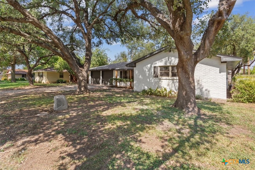 4412 Briar Cliff Road Temple, TX 76502 - Photo 2 of 28 a front view of a house with a yard