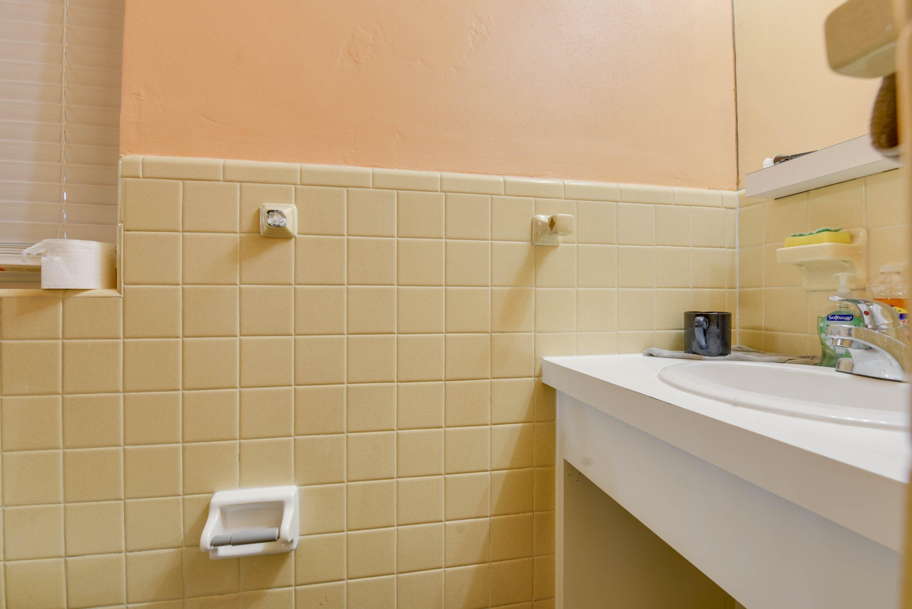 3421 Riviera Drive Key West, FL 33040 - Photo 18 of 32 a bathroom with a sink mirror and shower