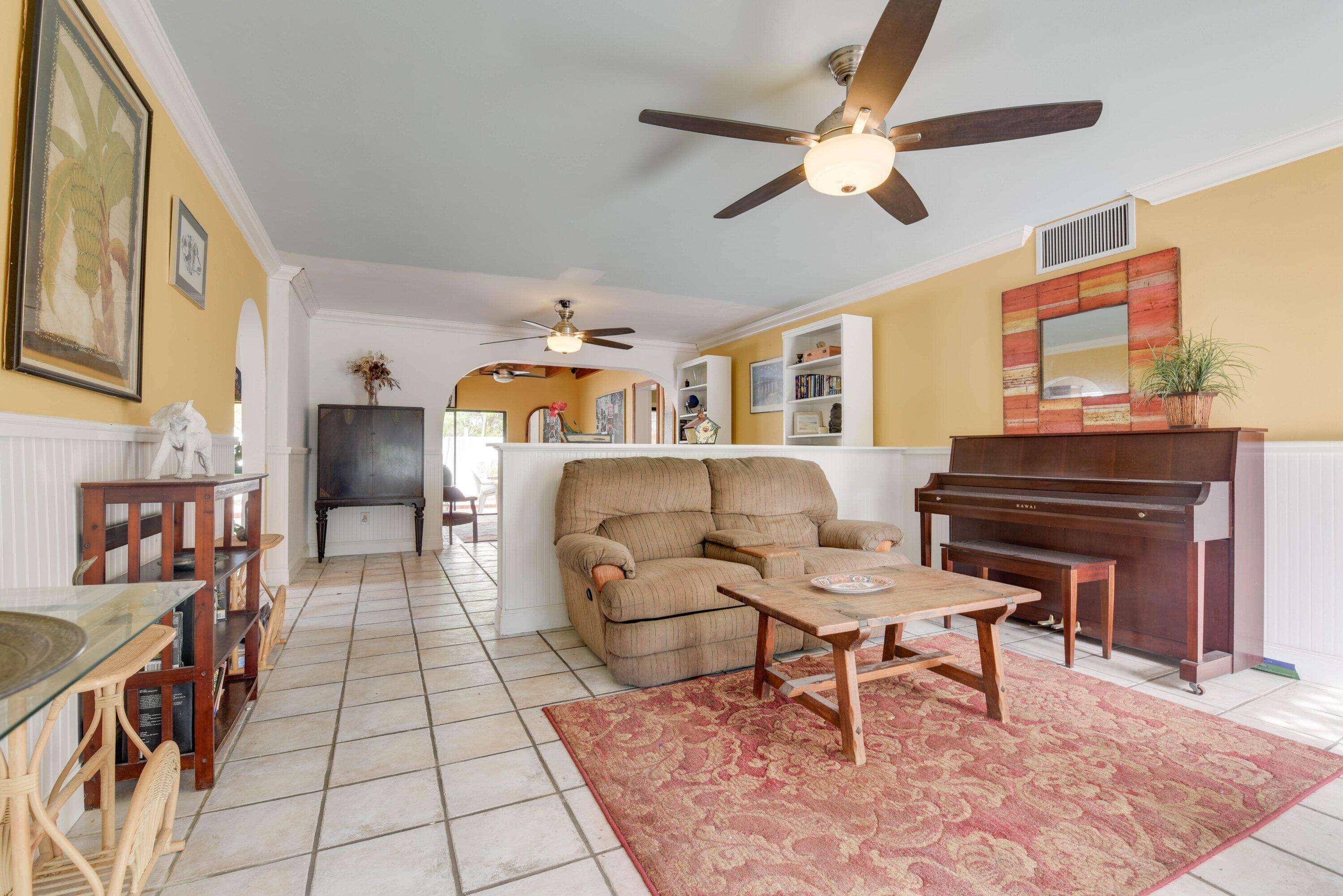 3421 Riviera Drive Key West, FL 33040 - Photo 7 of 32 a living room with furniture and a piano