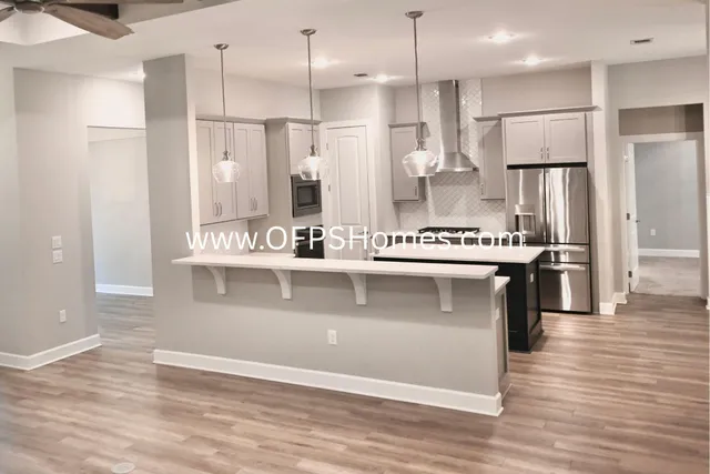 a view of a house with a garden