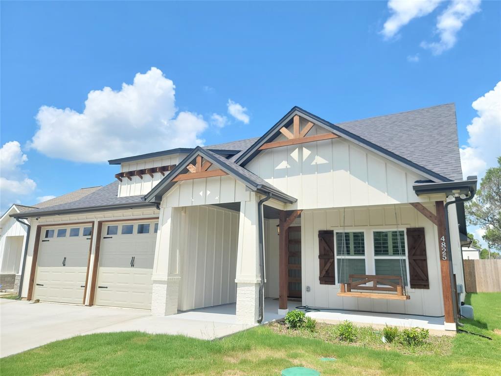 4825 Wichita Street Granbury, TX 76048 - Photo 4 of 30 a front view of a house with a yard