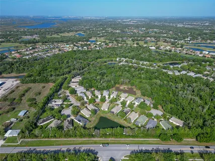 an aerial view of a city with lots of residential buildings