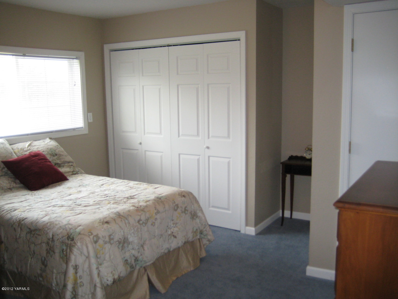 40 Elliott Road Cowiche, WA 98923 - Photo 16 of 24 a bedroom with a bed and a window