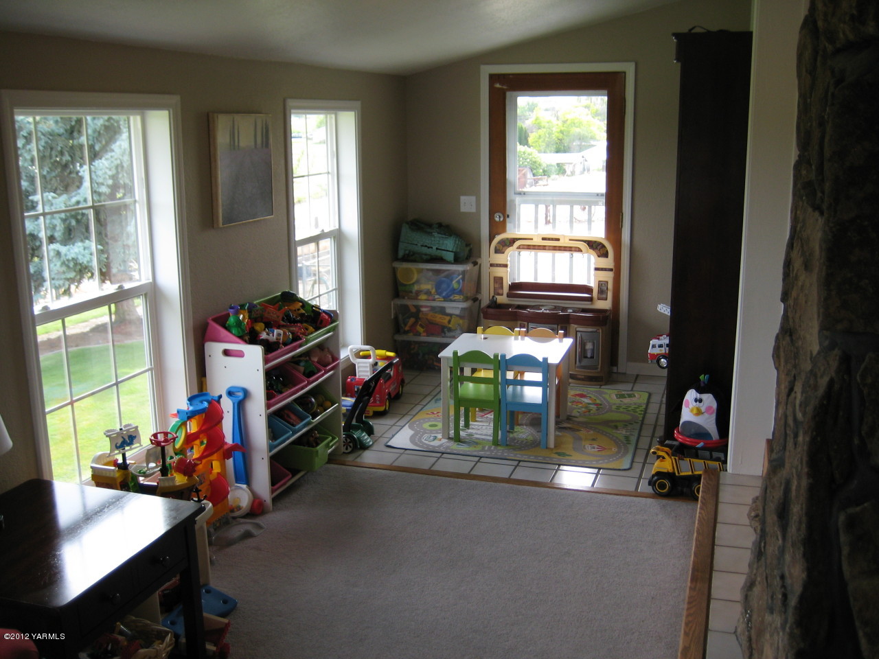 40 Elliott Road Cowiche, WA 98923 - Photo 9 of 24 a children room with toys and a flat screen tv