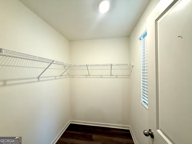 a view of a room with racks on the wall