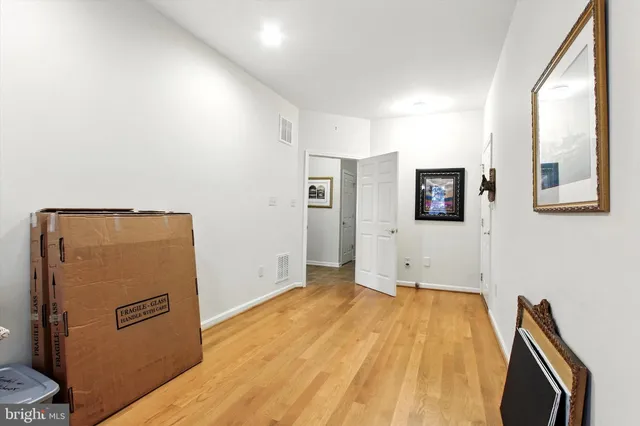 a view of a livingroom with wooden floor