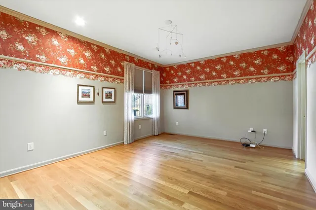 a view of a room with lots of wooden floor