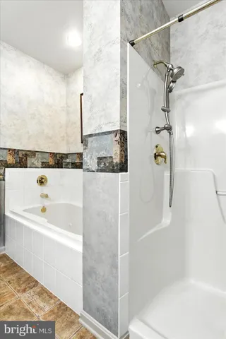 a view of a back yard with potted plants