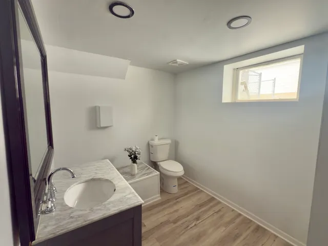 a bathroom with a sink and a toilet