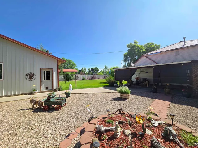 a view of outdoor space yard deck patio and fire pit