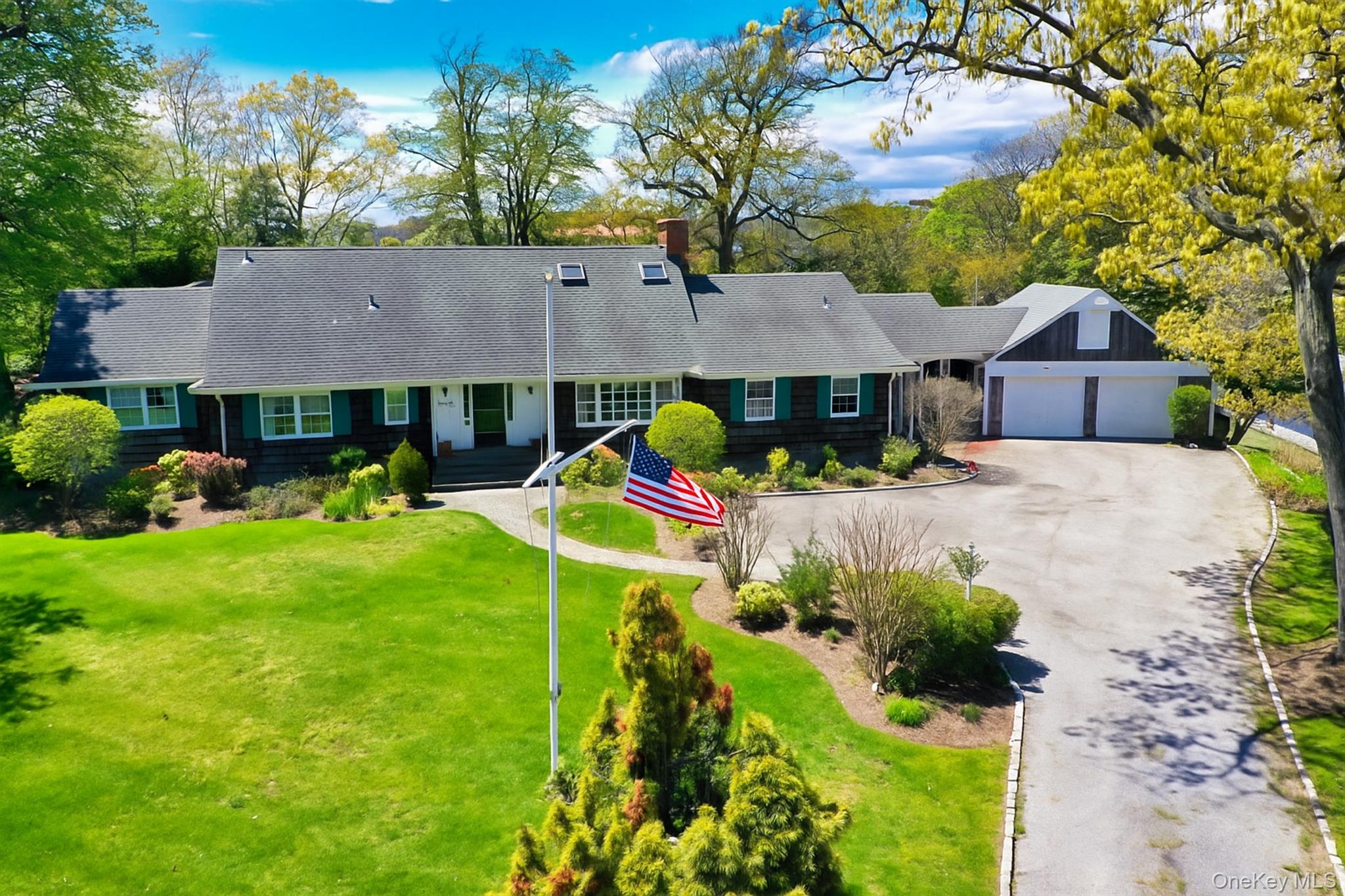 272 Ocean Avenue Islip, NY 11751 - Photo 2 of 39 a front view of a house with garden