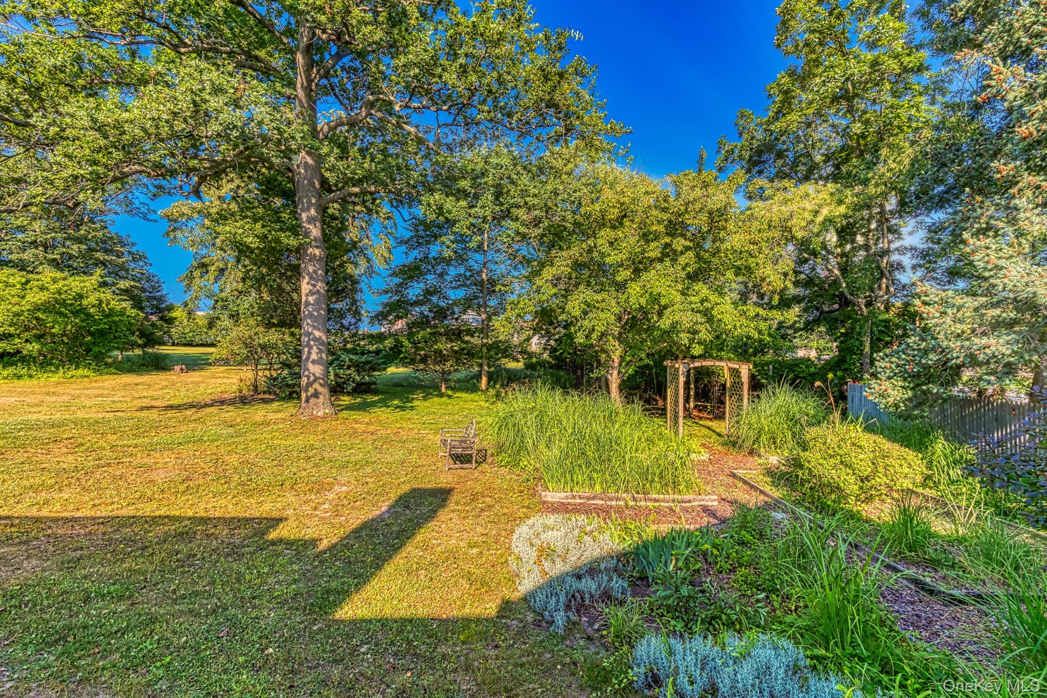 272 Ocean Avenue Islip, NY 11751 - Photo 31 of 39 a view of a swimming pool with an outdoor space and seating area