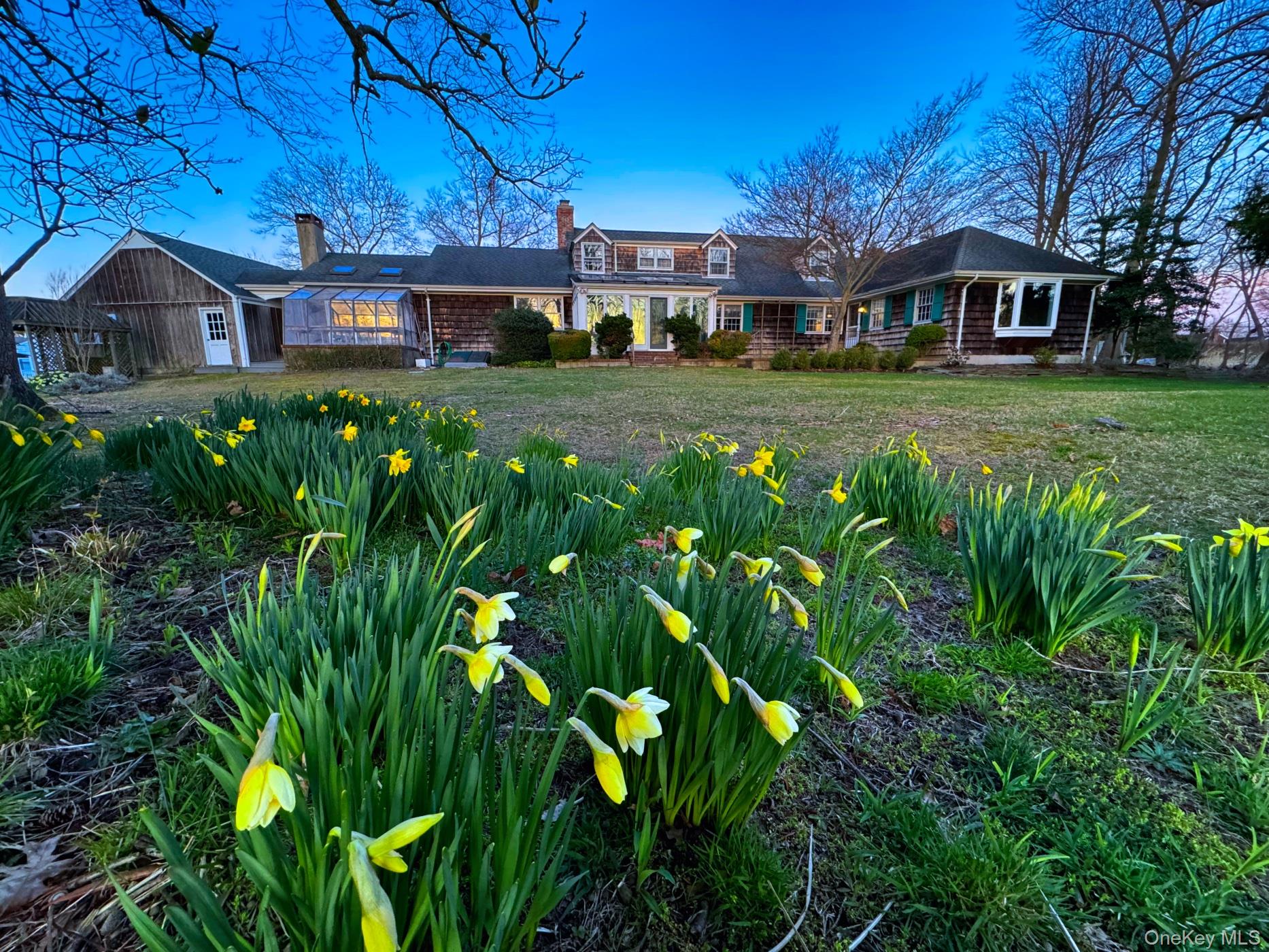 272 Ocean Avenue Islip, NY 11751 - Photo 5 of 39 a front view of a house with garden