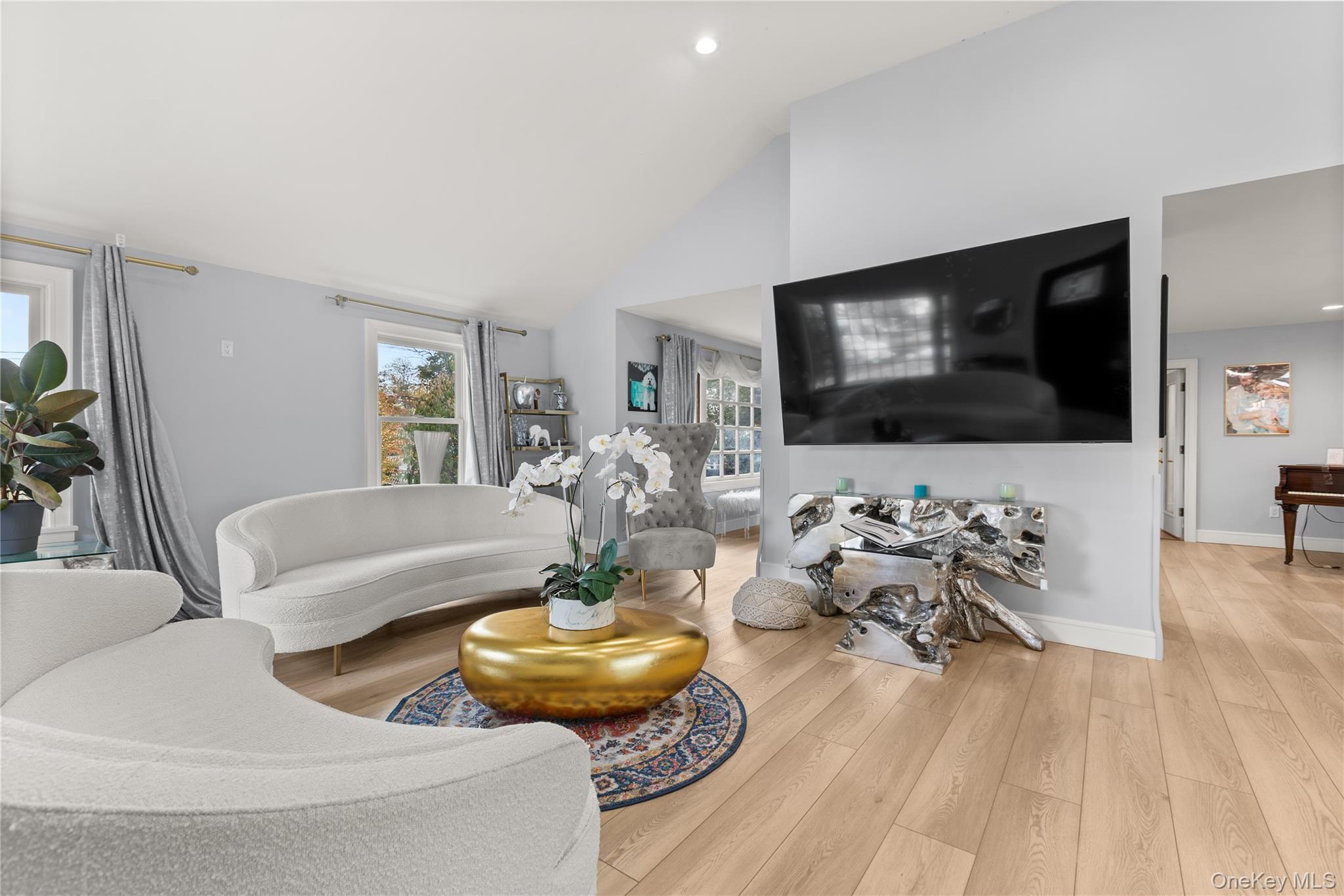 272 Ocean Avenue Islip, NY 11751 - Photo 7 of 39 a living room with furniture and a flat screen tv