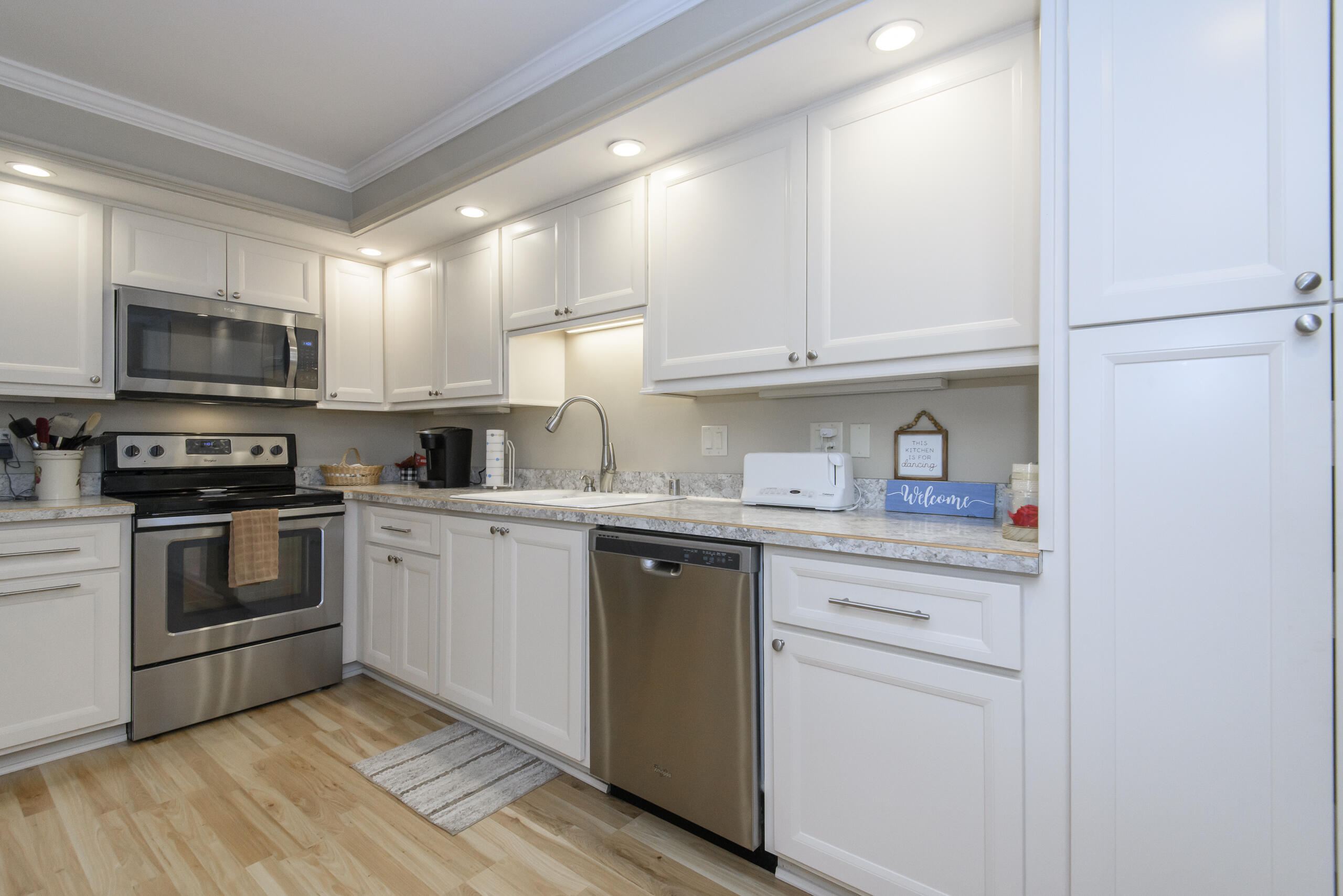 13335 Watertown Plank Road, Unit 109 Elm Grove, WI 53122 - Photo 6 of 25 SS Appliances and loads of light