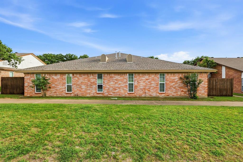 756 East Pecan Street Hurst, TX 76053 - Photo 2 of 19 a front view of house with yard and outdoor seating