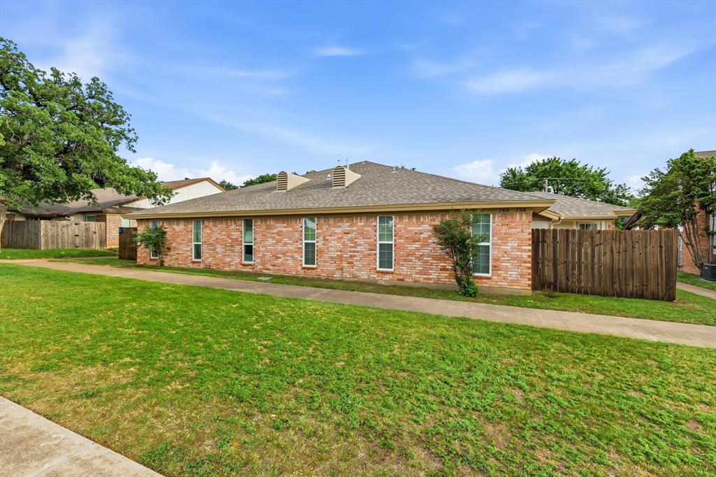 756 East Pecan Street Hurst, TX 76053 - Photo 10 of 19 a view of a house with a yard and sitting area