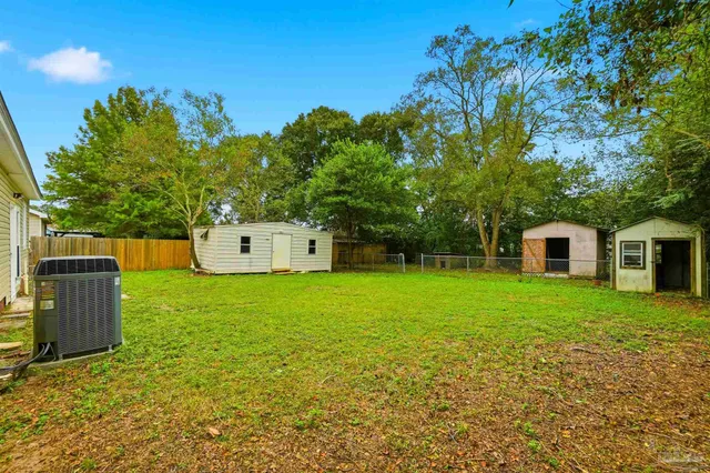 a house with a tree in front of it