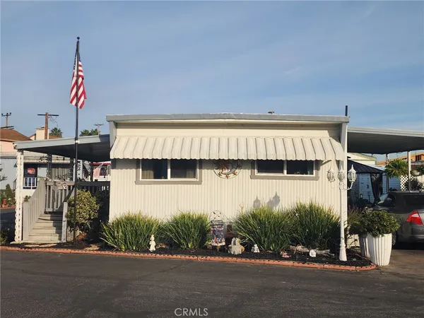 a front view of a house with garage
