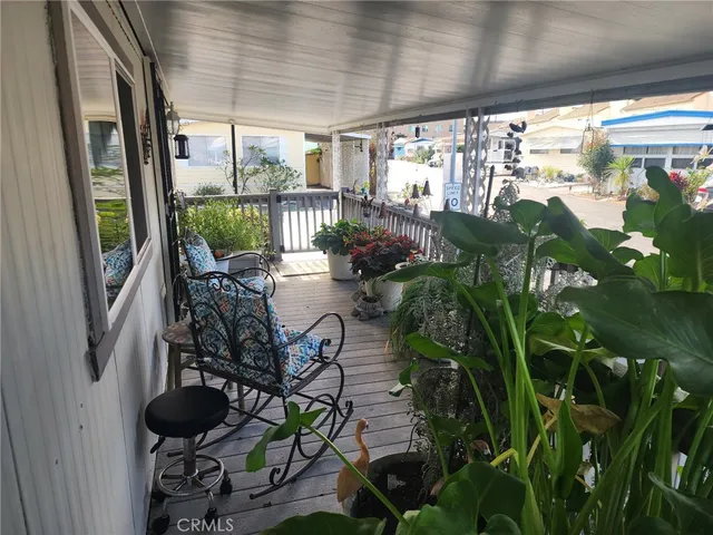 a view of a swimming pool with a porch