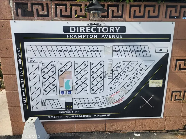 a kitchen with cabinets appliances a sink and a counter top space
