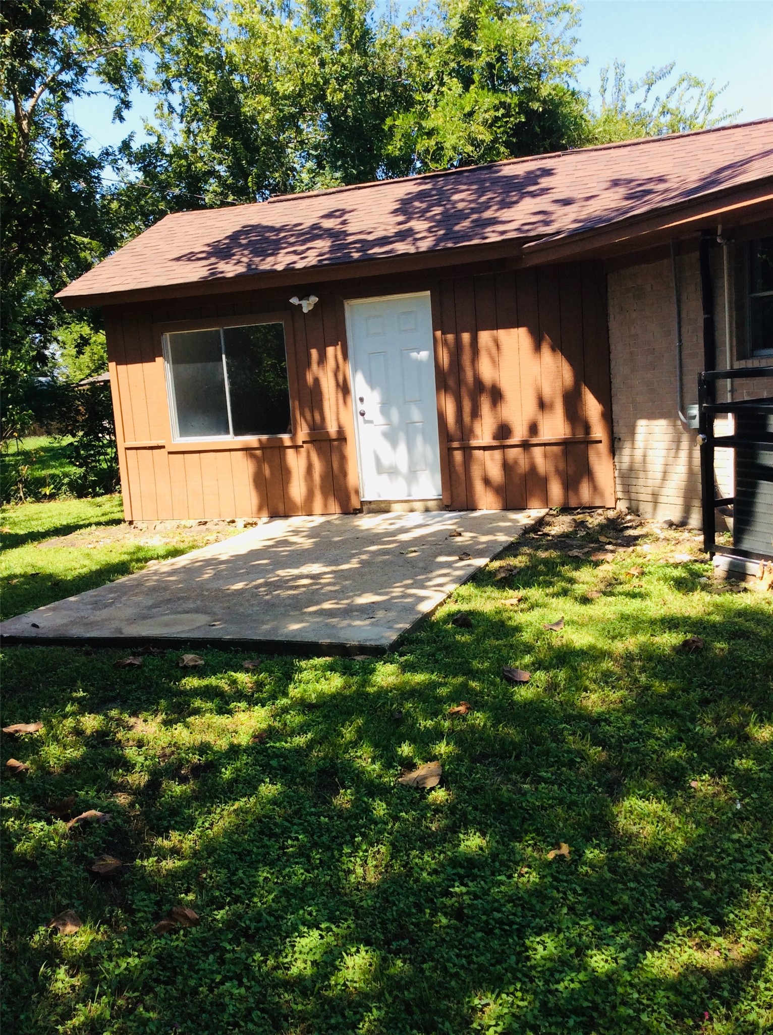 5218 Greylog Drive Houston, TX 77048 - Photo 17 of 19 View of Backyard with a patio area.