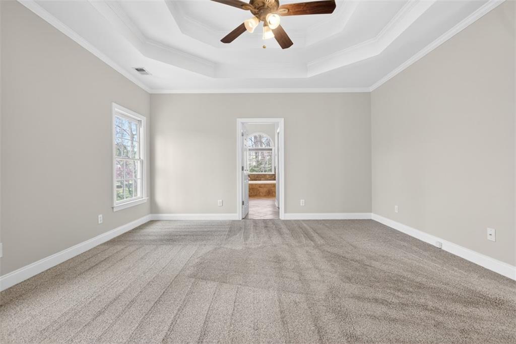 3570 Bulloch Lake Road Loganville, GA 30052 - Photo 14 of 71 a view of an empty room with a window