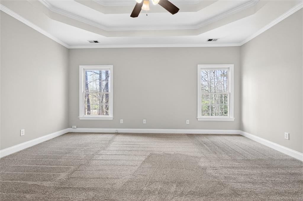3570 Bulloch Lake Road Loganville, GA 30052 - Photo 15 of 71 a view of an empty room with window and a closet