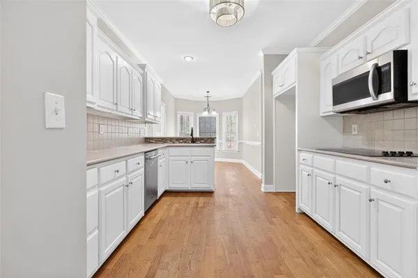 a bathroom with a sink a toilet and a bathtub