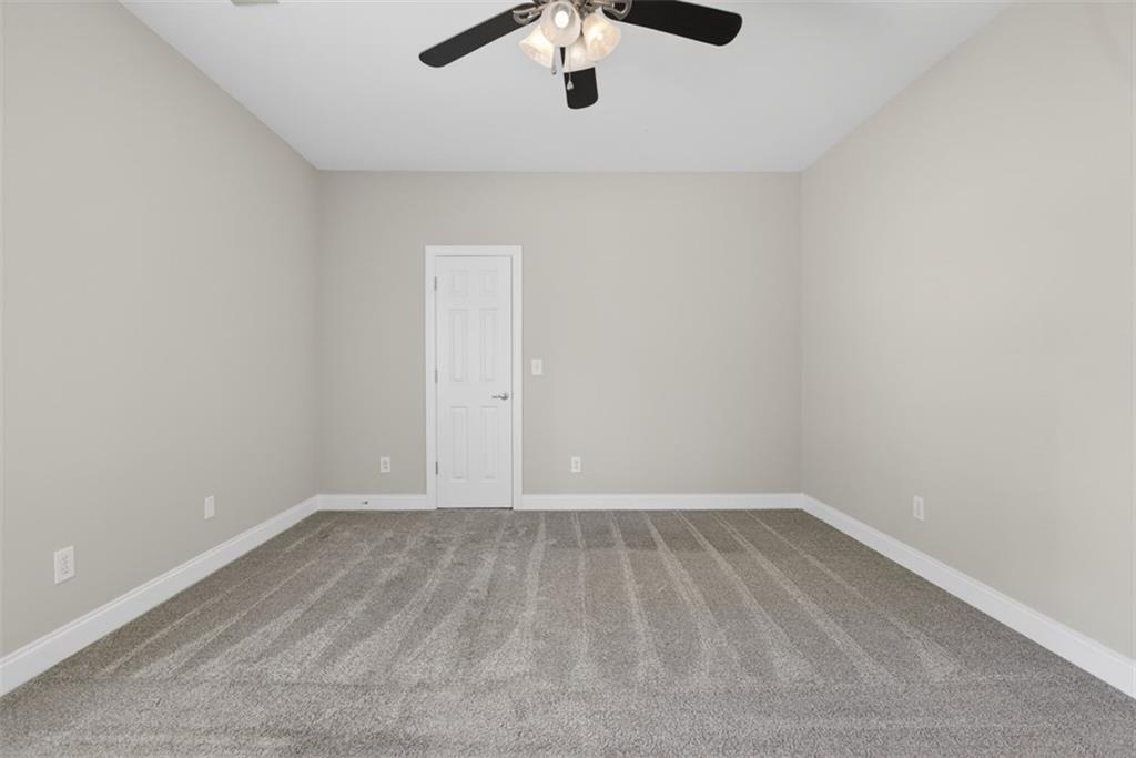 3570 Bulloch Lake Road Loganville, GA 30052 - Photo 40 of 71 a view of an empty room with a window
