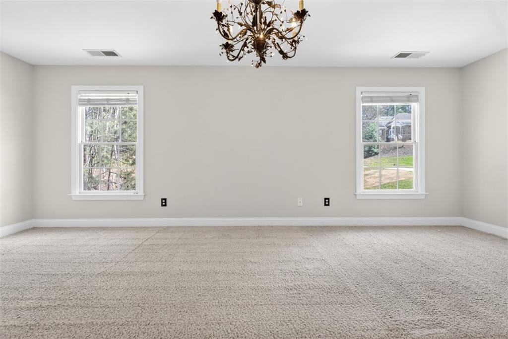 3570 Bulloch Lake Road Loganville, GA 30052 - Photo 47 of 71 an empty room with a window