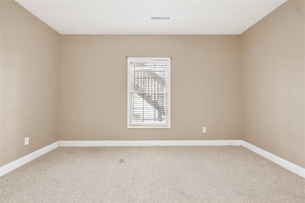 3570 Bulloch Lake Road Loganville, GA 30052 - Photo 56 of 71 a view of a small space with a window