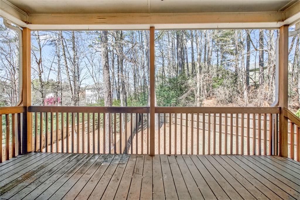 3570 Bulloch Lake Road Loganville, GA 30052 - Photo 64 of 71 a view of wooden balcony with outdoor space