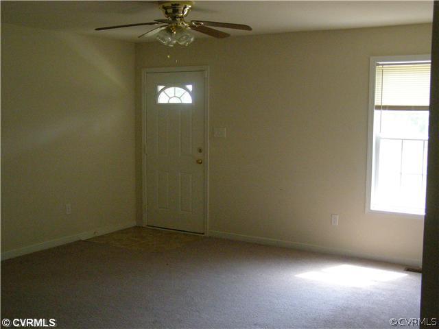 6350 Railroad Bed Road Carson, VA 23830 - Photo 3 of 12 an empty room with a window
