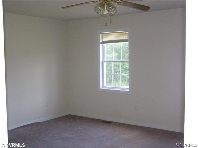 6350 Railroad Bed Road Carson, VA 23830 - Photo 6 of 12 an empty room with a window