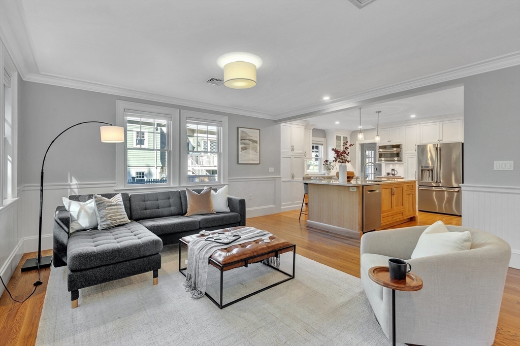 58 Bacon Street Winchester, MA 01890 - Photo 16 of 40 a living room with furniture and a large window
