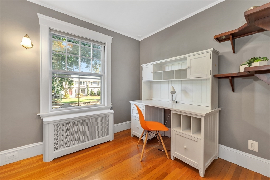 58 Bacon Street Winchester, MA 01890 - Photo 24 of 40 a living room with furniture and a window
