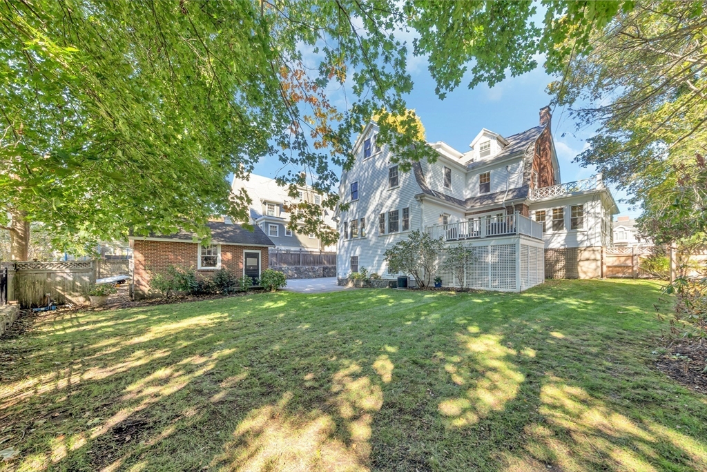 58 Bacon Street Winchester, MA 01890 - Photo 36 of 40 a view of a house with a yard