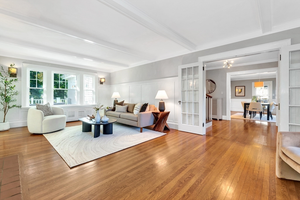 58 Bacon Street Winchester, MA 01890 - Photo 4 of 40 a living room with furniture and a table with wooden floor