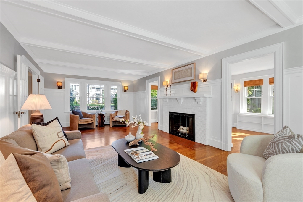 58 Bacon Street Winchester, MA 01890 - Photo 6 of 40 a living room with furniture and a fireplace
