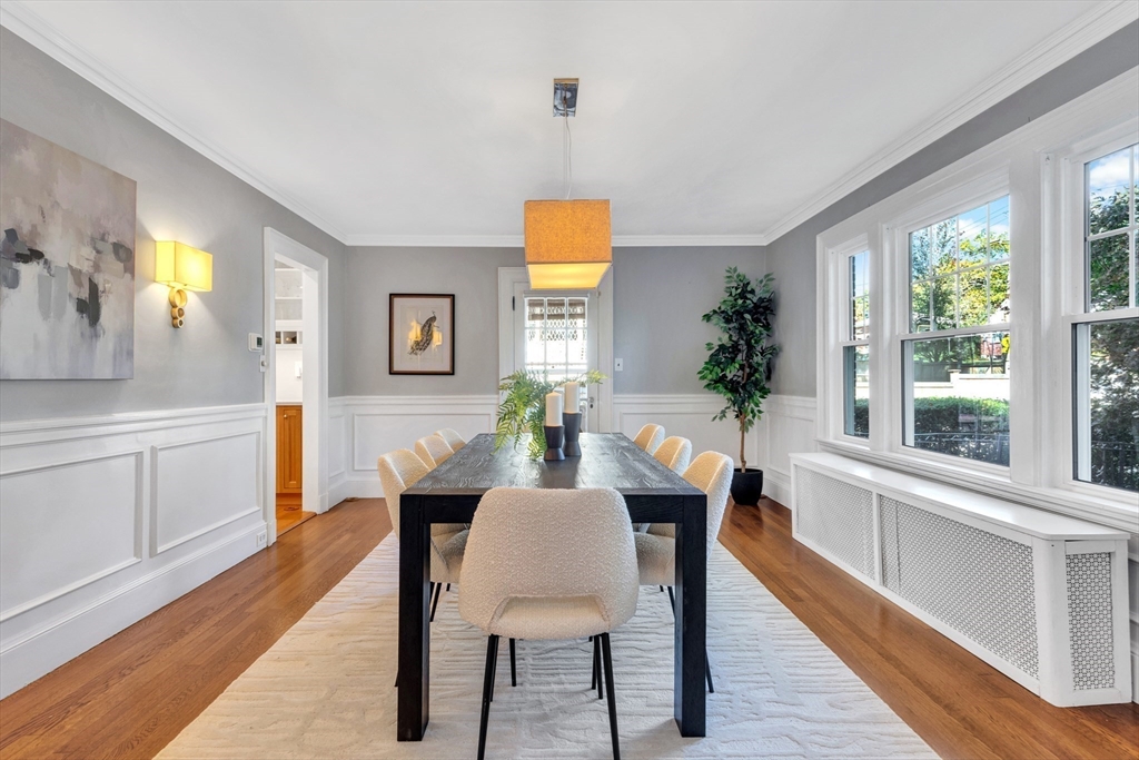 58 Bacon Street Winchester, MA 01890 - Photo 9 of 40 a view of a dining room with furniture window and wooden floor